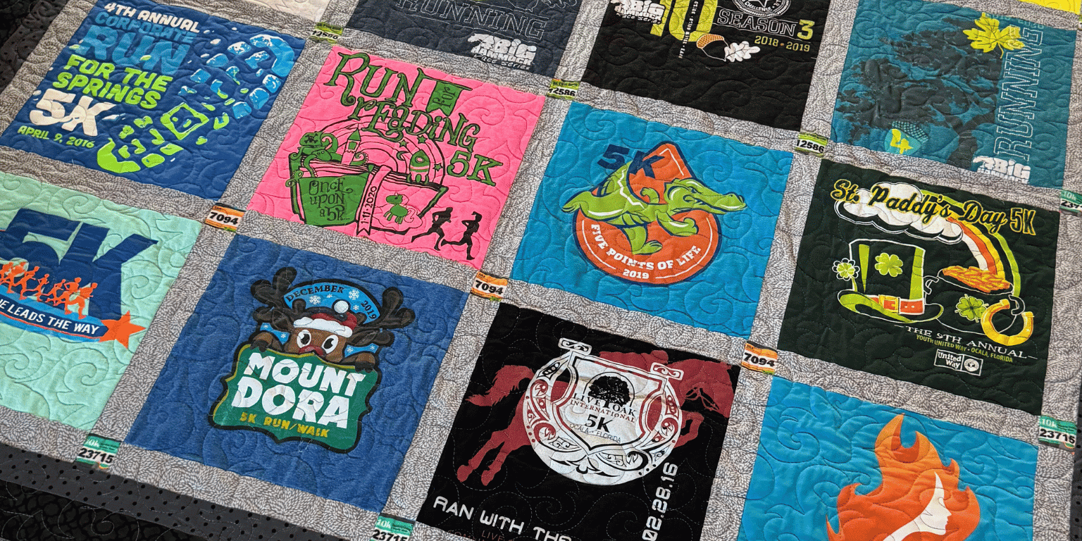 Athlete-inspired T-shirt memory quilt with colorful race shirts and edge-to-edge quilting