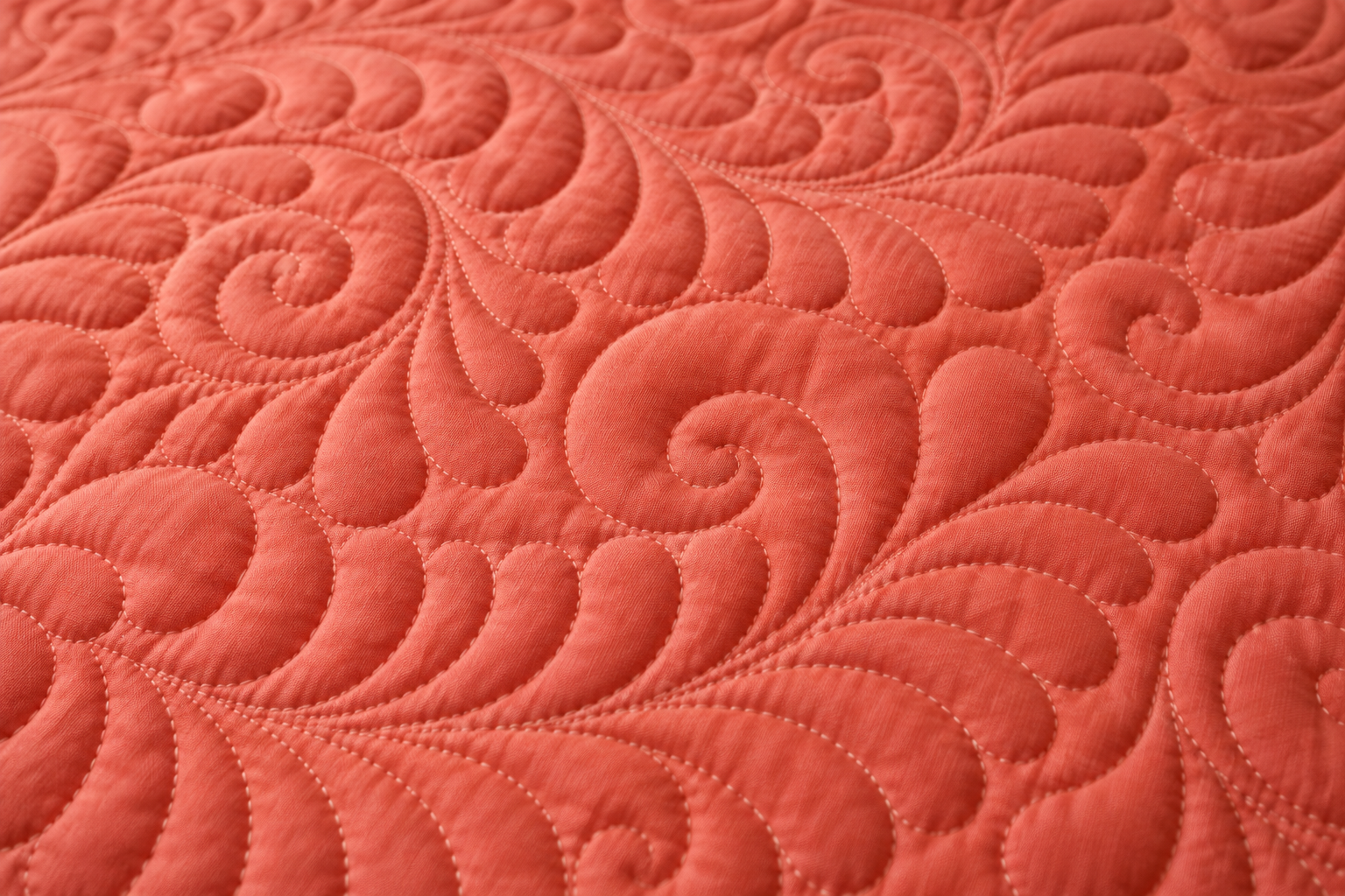 End to End Longarm stitching close up coral feathers